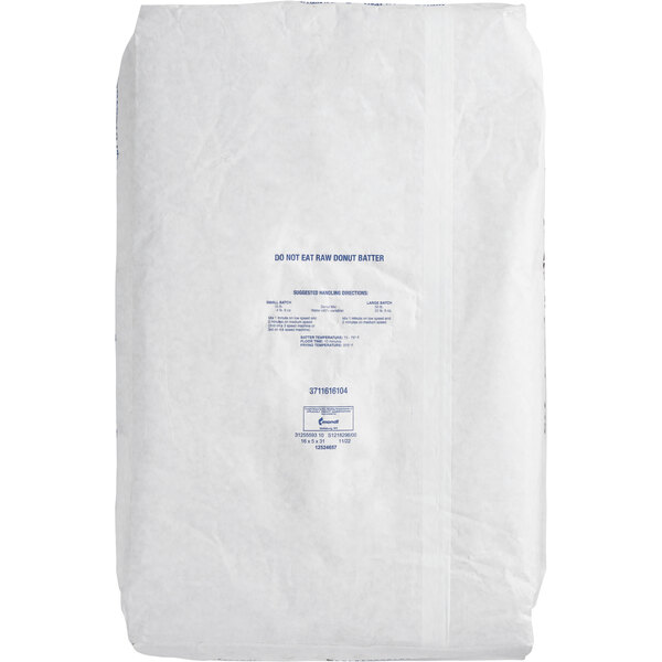 A white bag with blue and yellow Pillsbury Cake Donut Mix label.