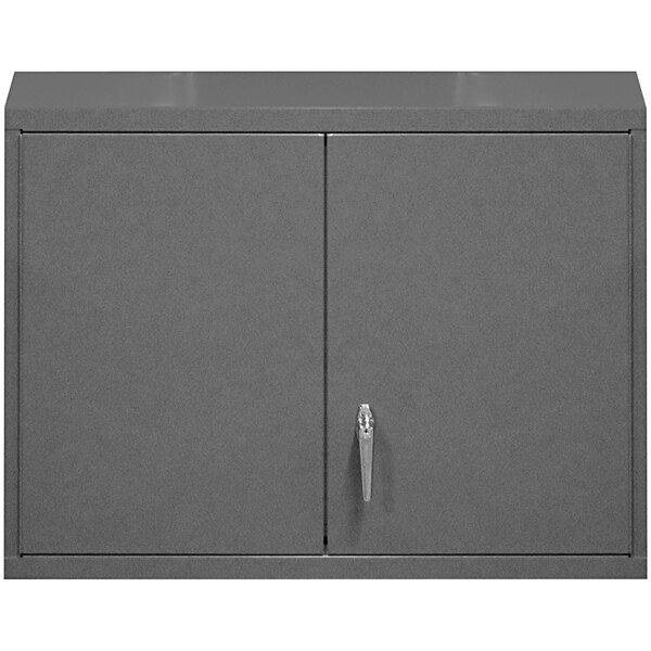 A grey metal Durham wall mounted storage cabinet with two shelves and a handle.