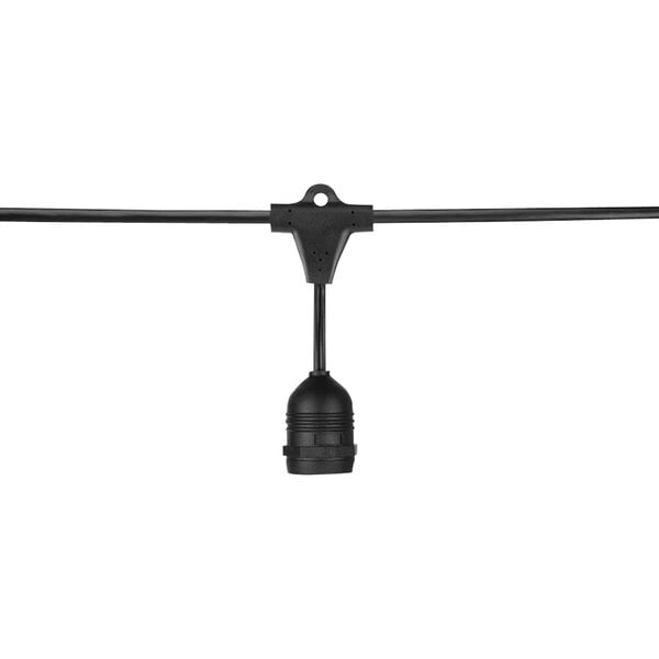 A close-up of a black cable with a black round object at the end.