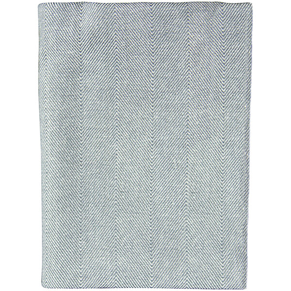 A close up of a grey and white Chevroni fabric pattern.