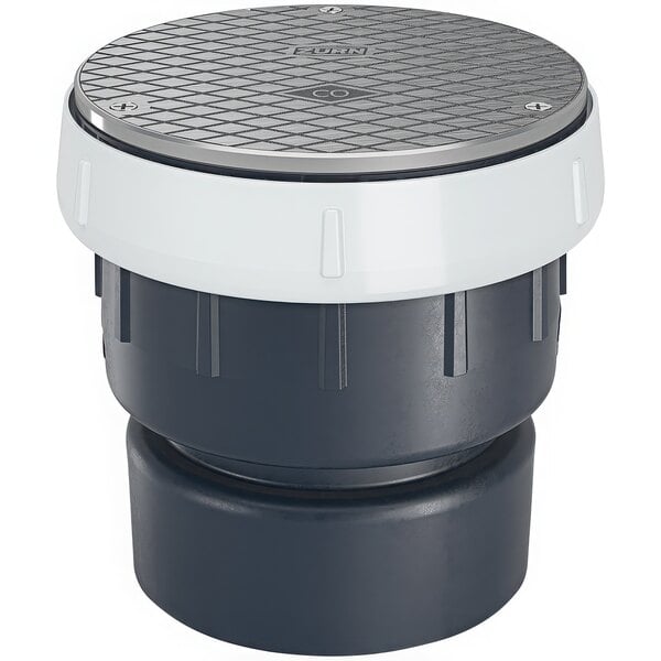 A black and white round Zurn PVC cleanout with a round nickel bronze cover.