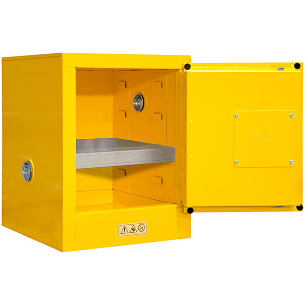 A yellow steel flammable storage cabinet with a manual door open.