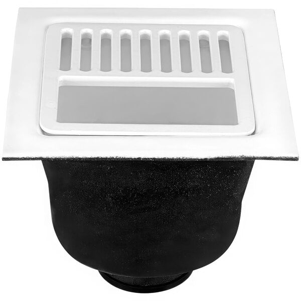 A black Zurn floor sink drain with a white square drain cover.