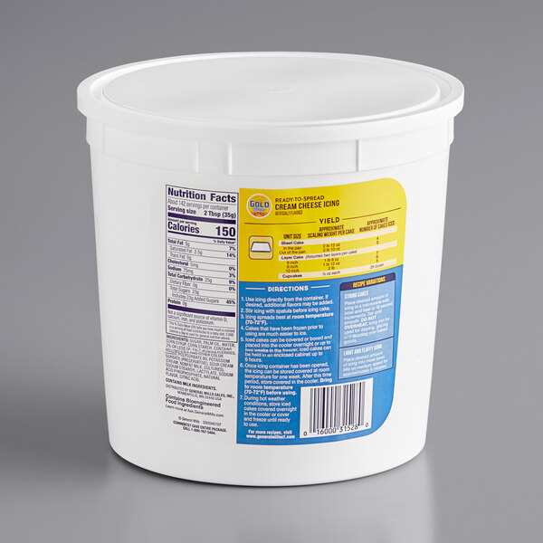 A white container of Gold Medal Ready-to-Spread Cream Cheese Icing with a yellow and blue label.