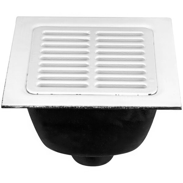 A Zurn white square floor sink with a white square grate.