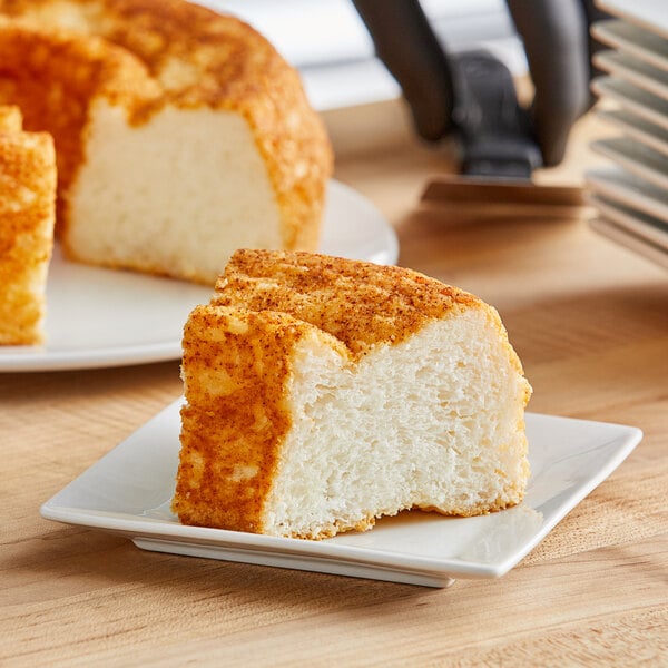 A slice of Pillsbury SimplyMix Angel Food Cake on a plate.