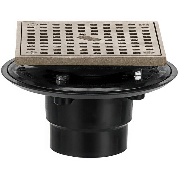 A Zurn black ABS floor drain with a square nickel bronze grate with holes.