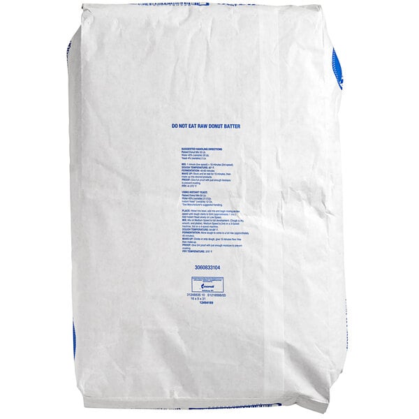 A white bag of Pillsbury Tender Taste Yeast-Raised Donut Mix with blue text.