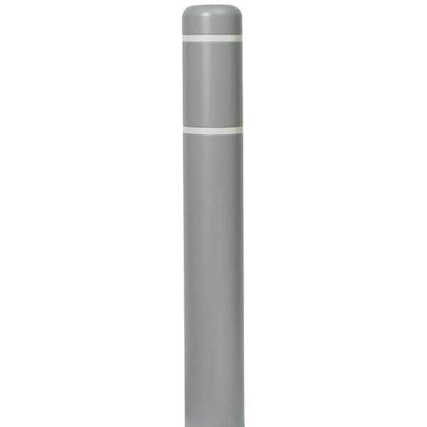 A grey cylindrical bollard cover with white stripes.