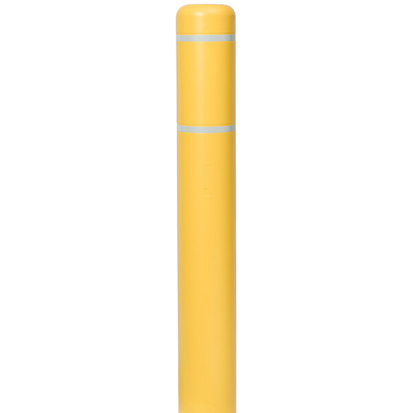 A yellow cylindrical object with white stripes.