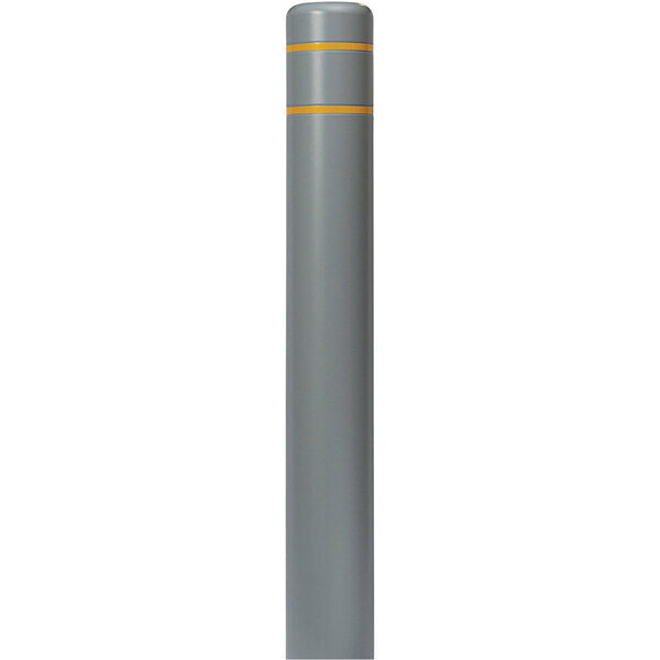 An Innoplast gray bollard cover with yellow stripes on it.