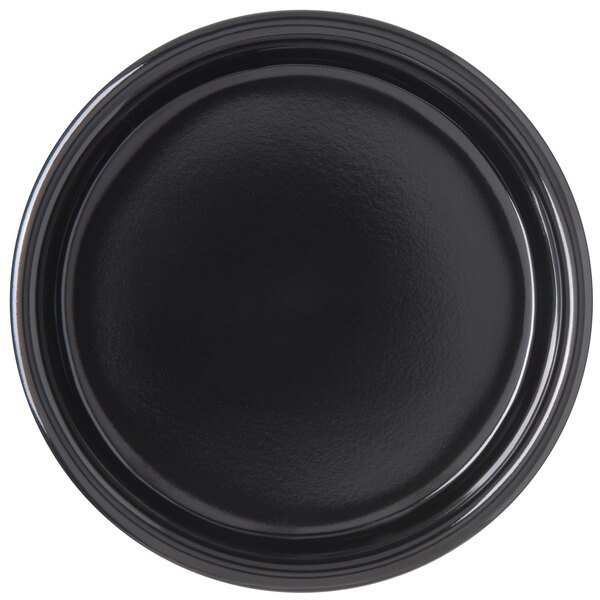 A black Carlisle ramekin with a round surface.