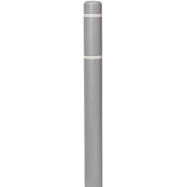 An Innoplast gray bollard cover with white reflective stripes on it.