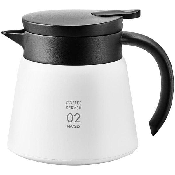 A white Hario V60 insulated stainless steel coffee server with a black handle.