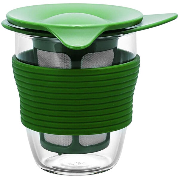 A green glass tea cup with a green lid.