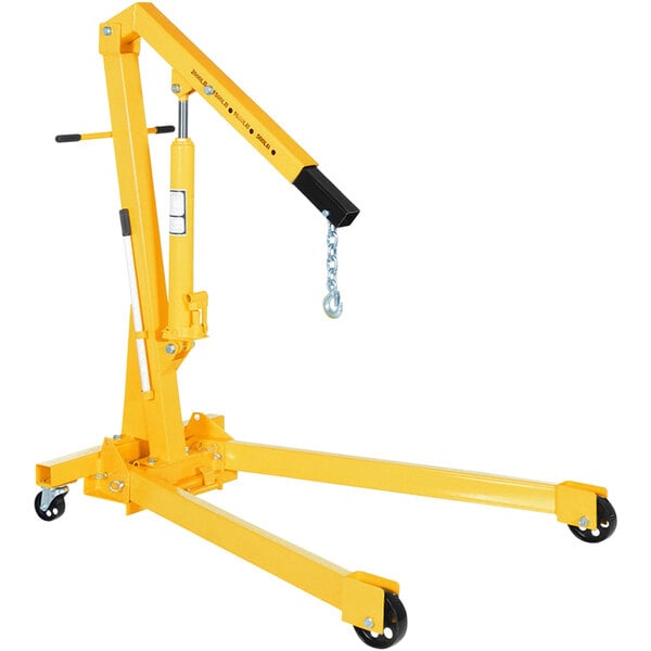 A yellow Vestil heavy-duty hydraulic telescoping crane with a chain attached.