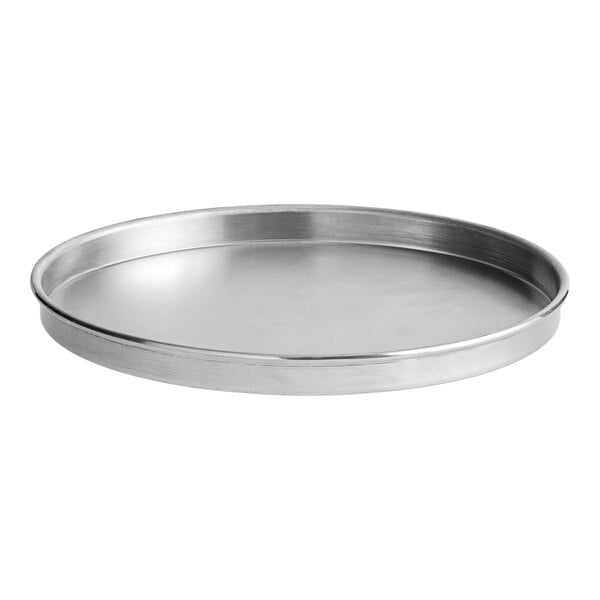 An American Metalcraft heavy weight aluminum pizza pan with straight sides and a silver rim.