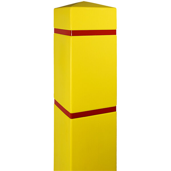 A yellow bollard cover with red reflective stripes.