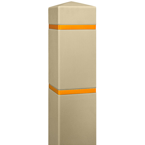 A tan square Innoplast BollardGard with yellow reflective stripes on a post.