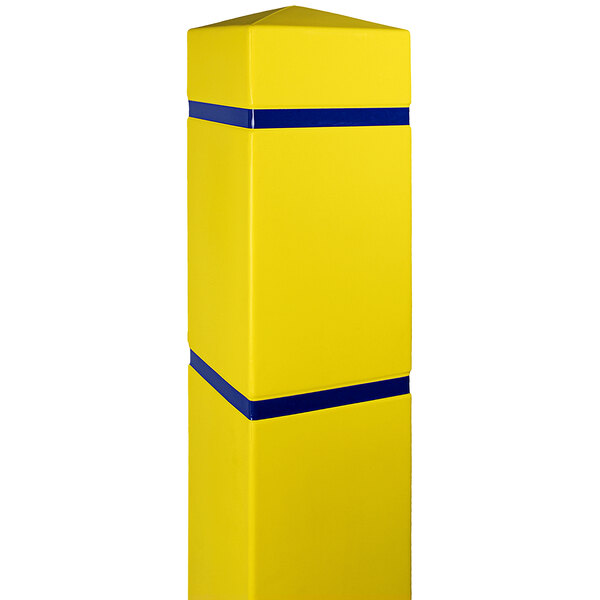 A yellow Innoplast bollard cover with blue reflective stripes on a square pillar.