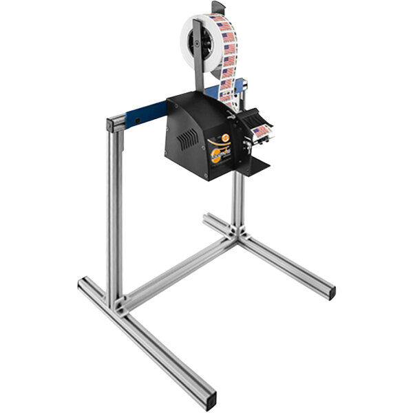 A Start International LD Series label dispenser machine with a roll of labels on it.