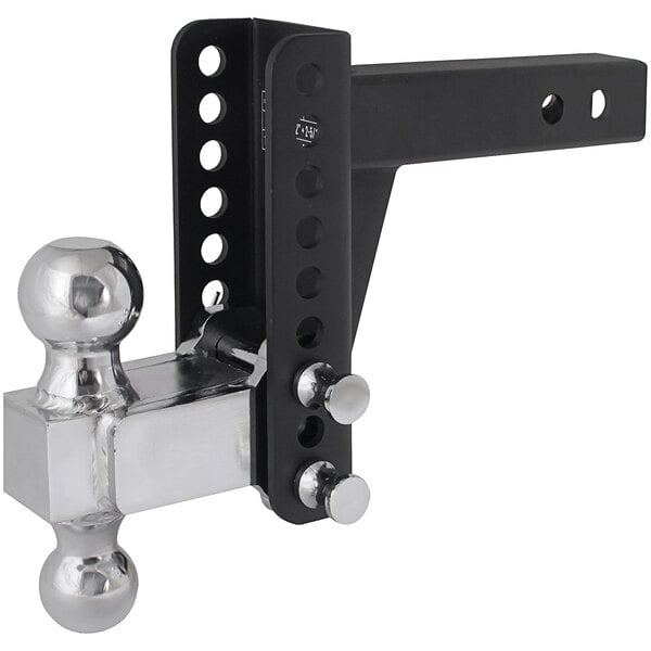 A black and silver Trailer Valet drop hitch with circles on the black metal.