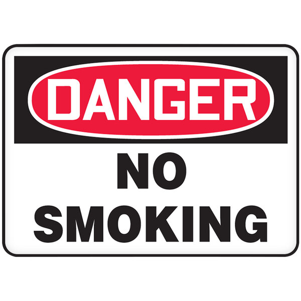 A white plastic Accuform safety sign with red and black rectangles and a red circle with white text reading "Danger / No Smoking"