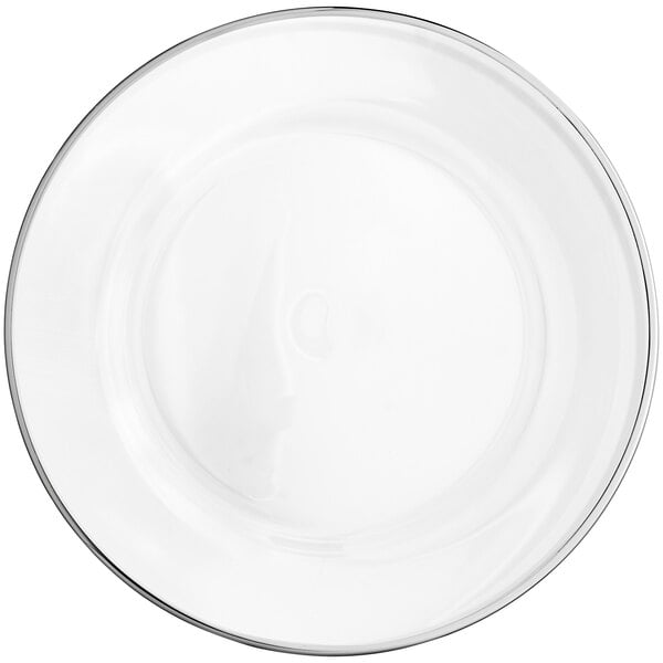 A clear glass plate with a silver rim.