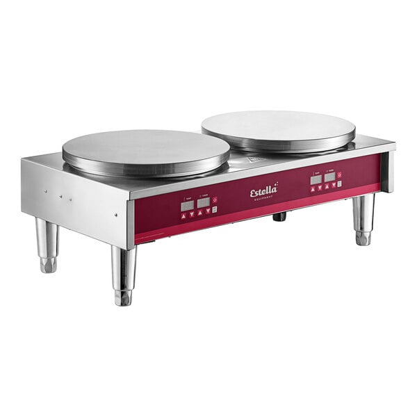 A Estella double crepe maker machine on a counter with two round plates.