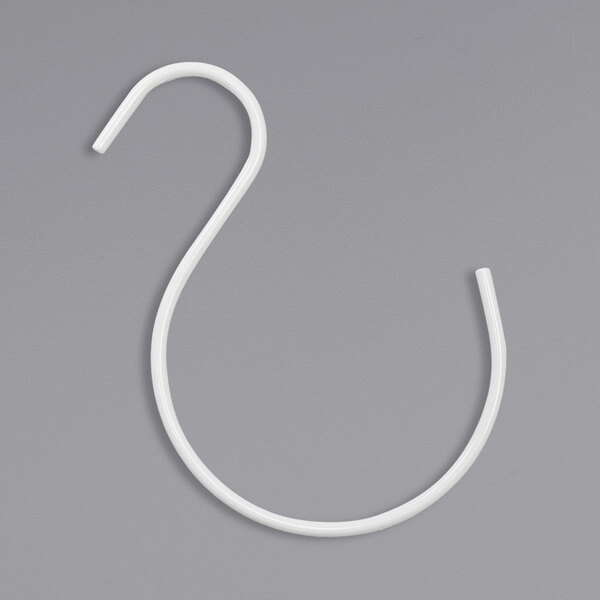 A white S-shaped pants hook.