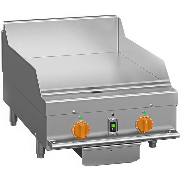 A Wood Stone commercial liquid propane Plancha griddle with two knobs on a large metal surface.