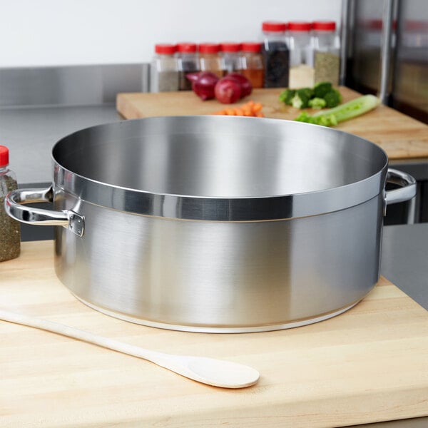 A large silver Vollrath Centurion brazier pan on a counter.