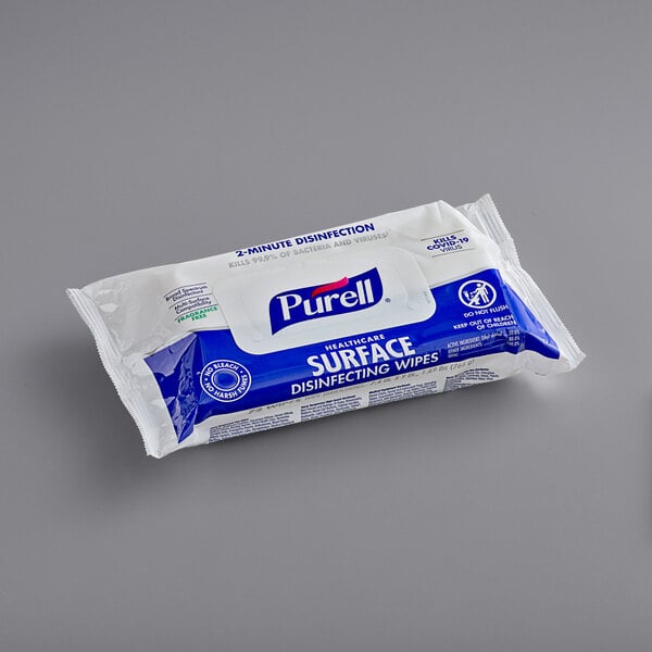 A package of Purell Healthcare Surface Disinfecting Wipes on a counter.