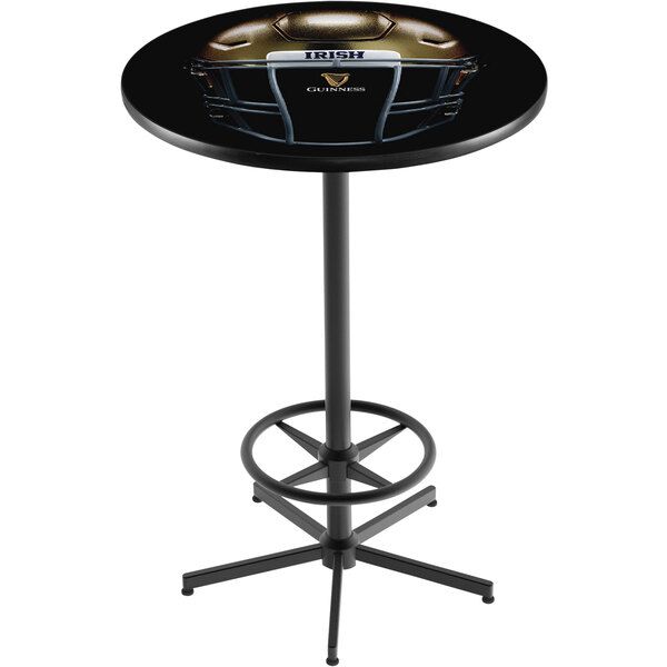 A black Holland Bar pub table with a Notre Dame football helmet on it.