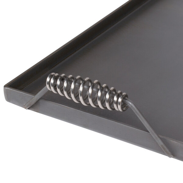 A black metal FMP griddle tray.