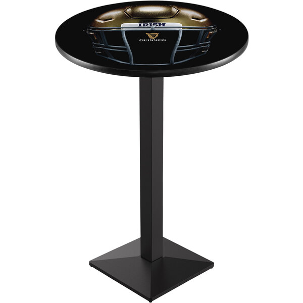 A black counter height pub table with a Notre Dame football helmet on it.