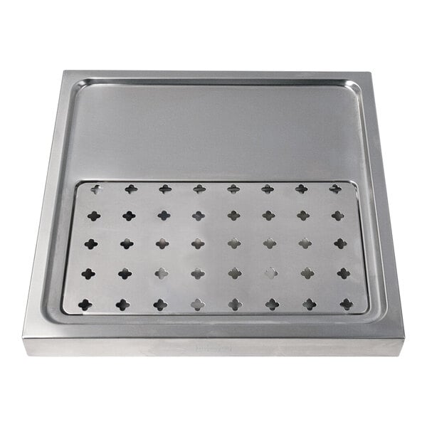 A stainless steel Micro Matic platform drip tray with holes in it.