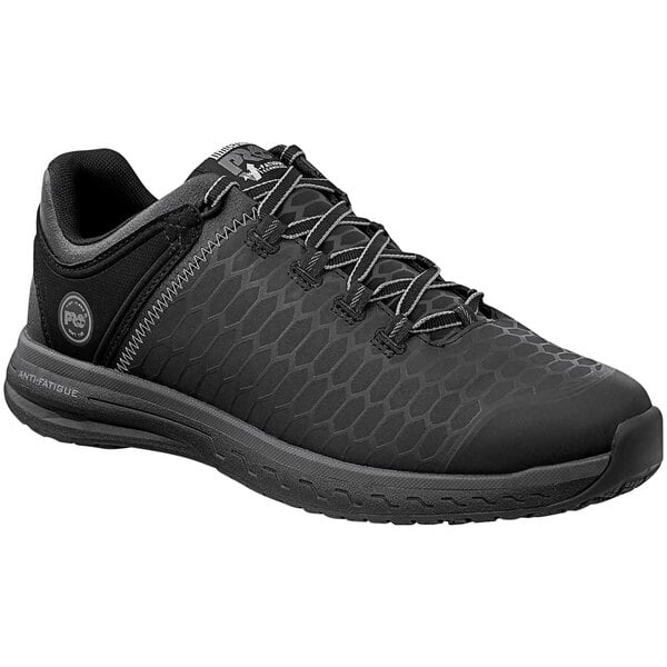 A black Timberland PRO Powerdrive soft toe athletic shoe for men with laces.