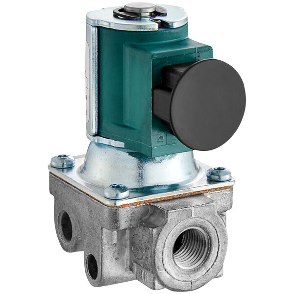 A close-up of an AccuTemp gas enrichment pilot valve with a green button.