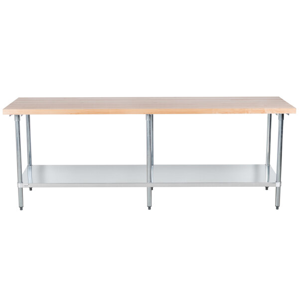 An Advance Tabco wood top work table with a galvanized base and undershelf.