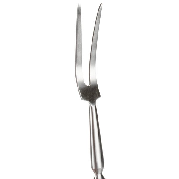 A Winco silver forged pot fork with a long handle.