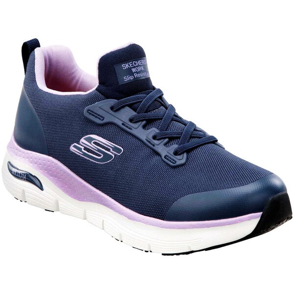 A navy and alloy Skechers Leslie women's non-slip athletic shoe.