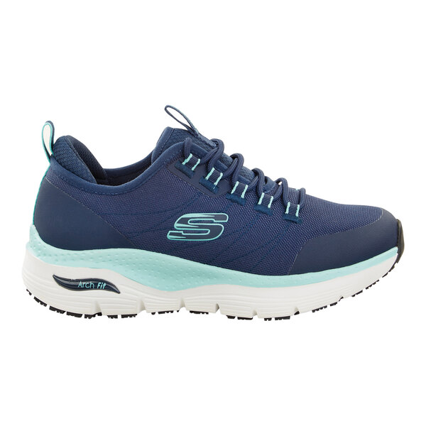 A navy and aqua women's athletic shoe with a soft toe and non-slip sole.