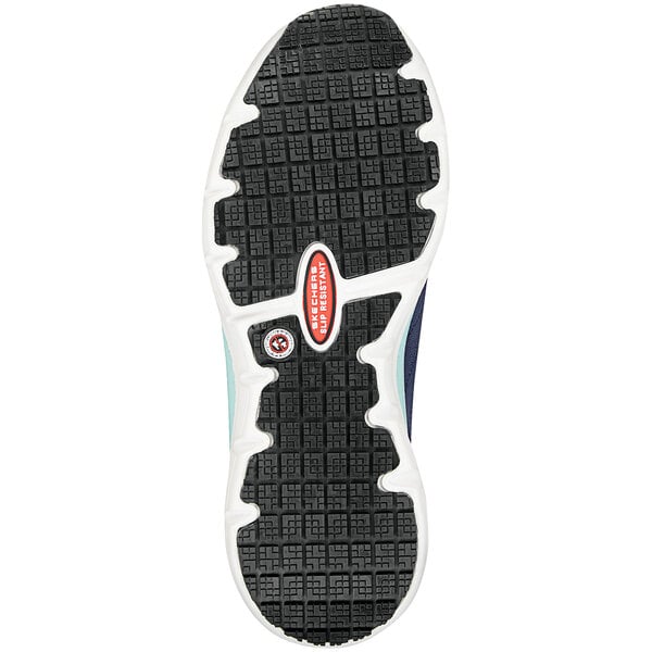 The navy and aqua sole of a Skechers Work Sadie non-slip athletic shoe.