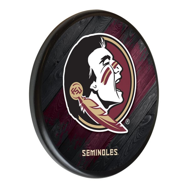 A round white wooden sign with the Florida State Seminoles logo.