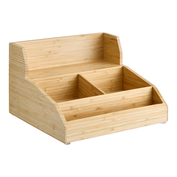 A wooden Cal-Mil condiment organizer with a couple compartments.