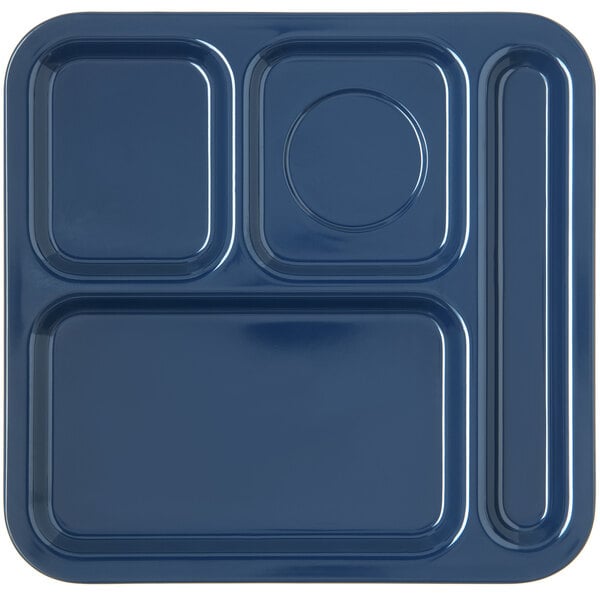 A dark blue rectangular Carlisle tray with four compartments.