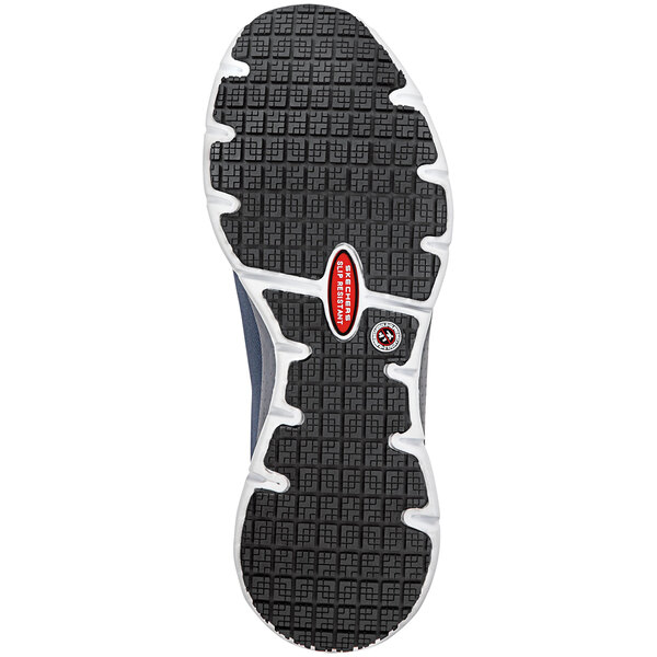 The navy and white sole of a Skechers Work Jake men's athletic shoe.