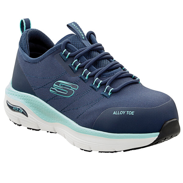 A close up of a navy and aqua Skechers Work Sadie athletic shoe.