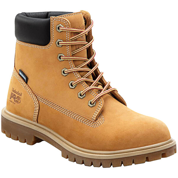 A pair of women's brown Timberland PRO steel toe leather boots with black laces.